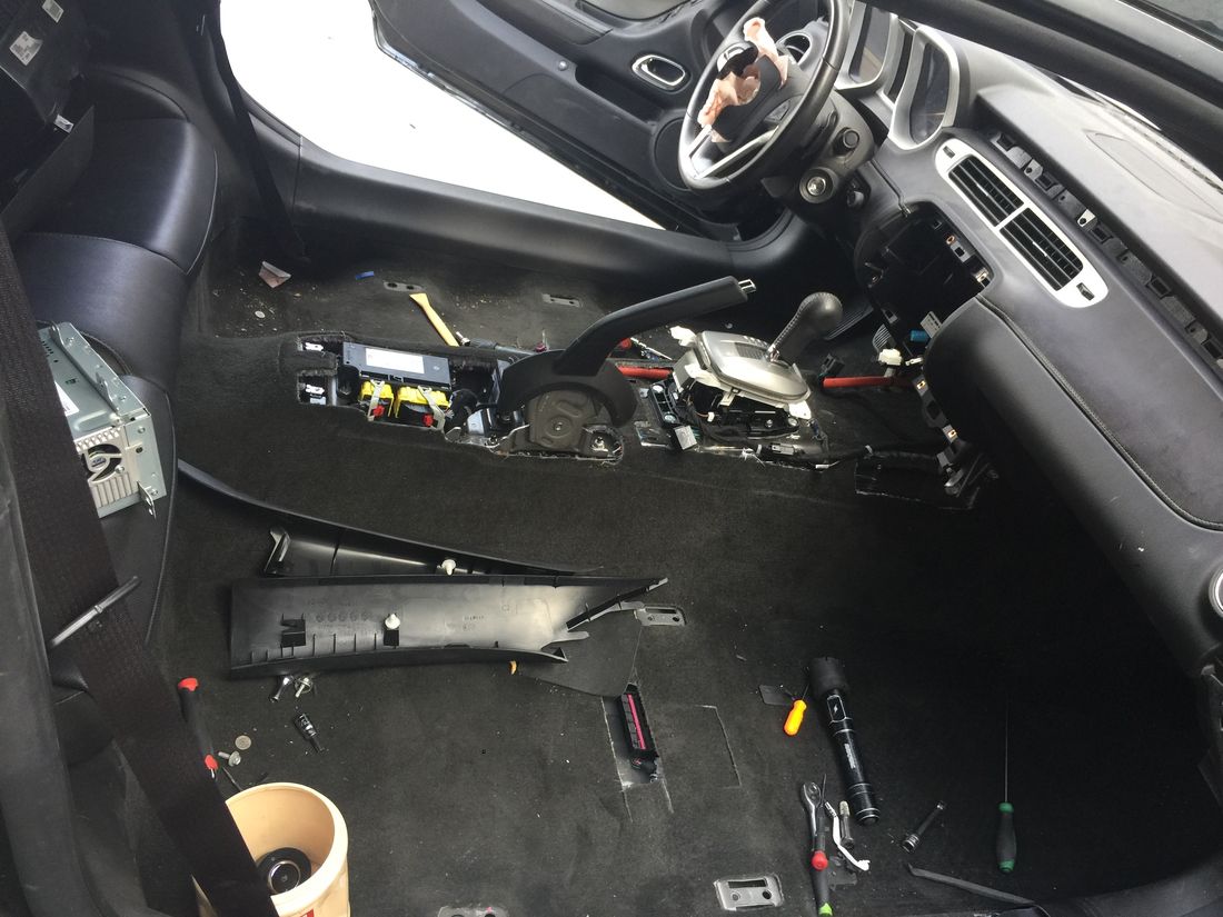 Chevrolet Camaro with dashboard fully disassembled during dash replacement