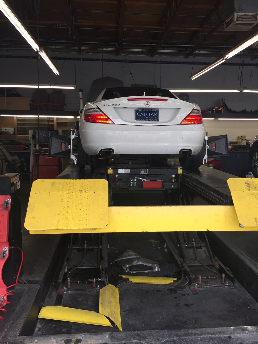 Mercedes-Benz SLK300 on the alignment rack at Studio Autoworks & Collision Center
